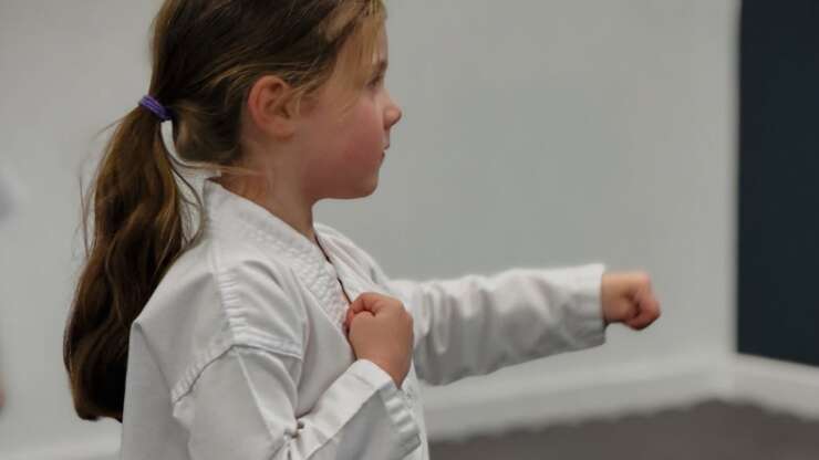 Why do bullies target certain children, and how can I help?