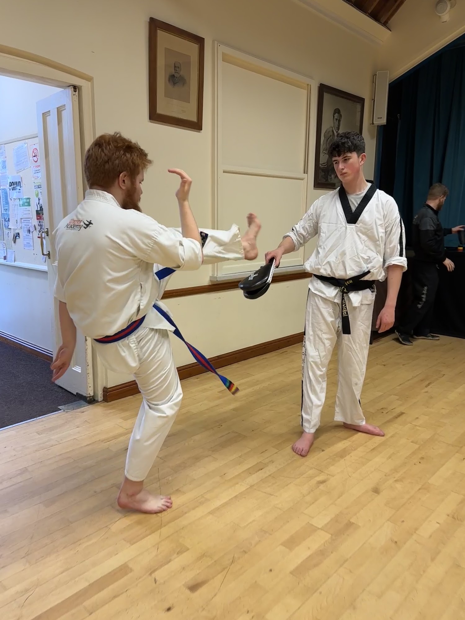 Adults sparring in a Warrior Academy class